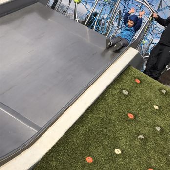 Tarkington Park - Hands in the air and he zips down the fast slide! Child's play is awesome here! - Tennis Near Me - Indianapolis, Indiana Tarkington Park - Hands in the air and he zips down the fast slide! Child's play is awesome here! - Tennis Near Me - Indianapolis, Indiana