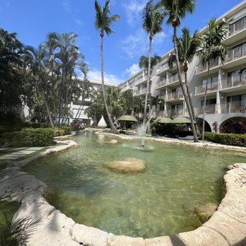 Marriott Grand Cayman - Outdoor space heading towards the pool and beach area - Resorts Near Me - Salinas, California