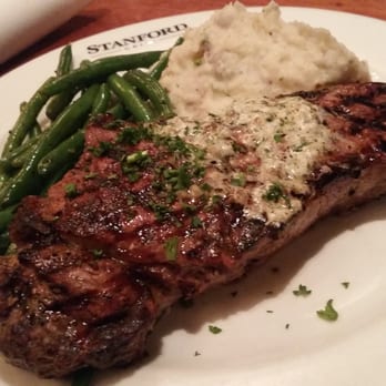 Glenwood's - NY strip steak with mashed potatoes and greens. - American Near Me - Columbia, Maryland