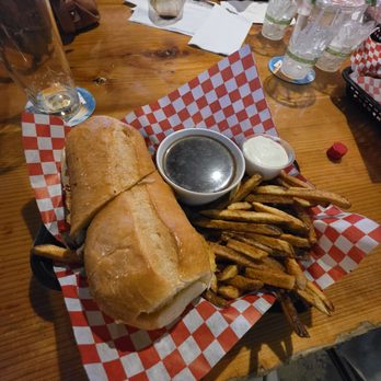 Bootleggers Bar & Grill - Burger dip with au jus and potato-cut fries, ranch on the side. Very good. - American Near Me - Buckley, Washington Bootleggers Bar & Grill - Burger dip with au jus and potato-cut fries, ranch on the side. Very good. - American Near Me - Buckley, Washington