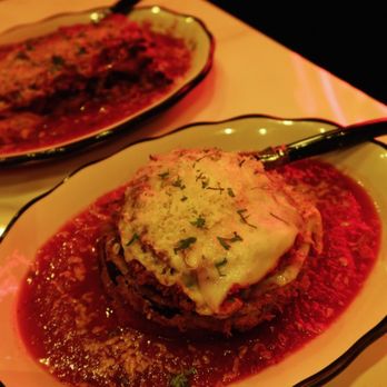 Uncle Dom's Italian Kitchen - Eggplant Parmesan (10/10) - savory and stacked eggplant, mozzarella, marinara. Quintessential - Italian Near Me - Seattle, Washington Uncle Dom's Italian Kitchen - Eggplant Parmesan (10/10) - savory and stacked eggplant, mozzarella, marinara. Quintessential - Italian Near Me - Seattle, Washington