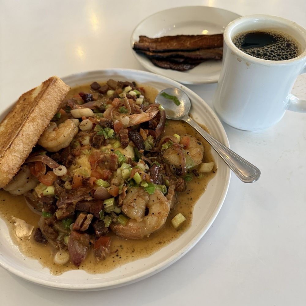 Bonnie Blue - Shrimp and grits with side of bacon and bottomless coffee. - Bakeries Near Me - Winchester, Virginia Bonnie Blue - Shrimp and grits with side of bacon and bottomless coffee. - Bakeries Near Me - Winchester, Virginia