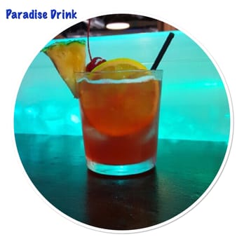 Mariscos El Rincon Bar & Grill - a drink with a garnish of orange - Seafood Near Me - Athens, Texas Mariscos El Rincon Bar & Grill - a drink with a garnish of orange - Seafood Near Me - Athens, Texas