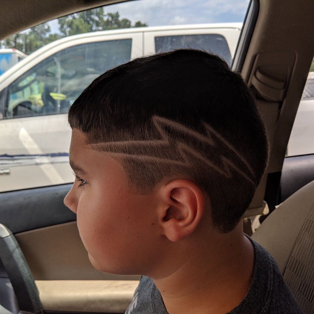 Haircut with fade and design Haircut with fade and design