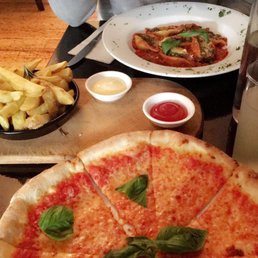 Margarita pizza w/ vegan cheese, spinach and ricotta stuffed shells and hand cut fries. Margarita pizza w/ vegan cheese, spinach and ricotta stuffed shells and hand cut fries.