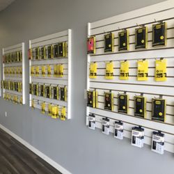 New Again Phone Repair Albemarle - Walls of phone accessories!