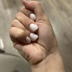 Nail Spa Beyond - Small chip at the edge of the middle finger first