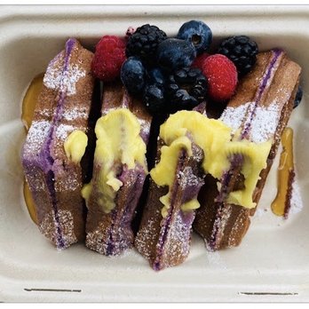 Laveta - Ube waffle with berries. #Breakfast - Coffee & Tea Near Me - Los Angeles, California Laveta - Ube waffle with berries. #Breakfast - Coffee & Tea Near Me - Los Angeles, California