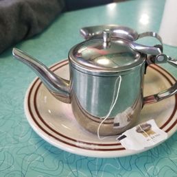 Tea - hot water pot w/milk on the side (if you use sugar, ask for that)