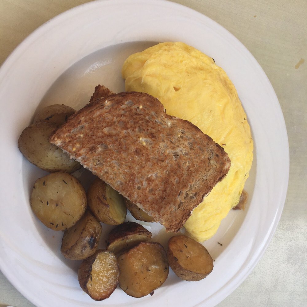 Nosh - Sedona omelette. Wrapped in a pre made egg shell of sorts. - New American Near Me - Geneva, Illinois Nosh - Sedona omelette. Wrapped in a pre made egg shell of sorts. - New American Near Me - Geneva, Illinois