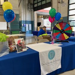 Chris Smiles Dental Care - We love to talk to new patients at company health and benefits fairs!