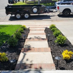 California Green Irrigation and Landscape - New plants, black wood chips and low voltage lights