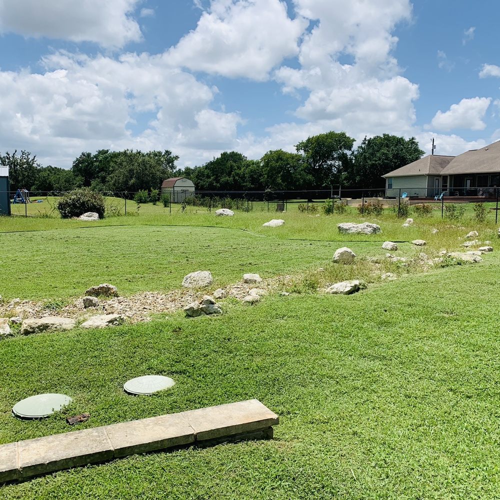 Liberty Lawn Care - a view of a dog park - Landscaping Near Me