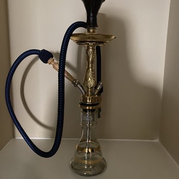 Al Madina - a hookah with a hose attached to it - International Grocery Near Me - Norcross, Georgia Al Madina - a hookah with a hose attached to it - International Grocery Near Me - Norcross, Georgia