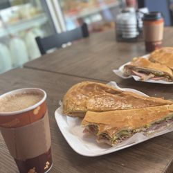 2 large Cuban sandwich. Two coffee Le Leche