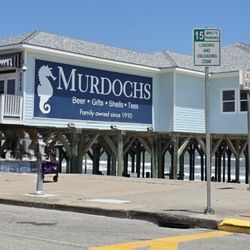 Galveston Slingshot Rentals - Murdoch's historic souvenir shop. Beer and awesome views of the water!