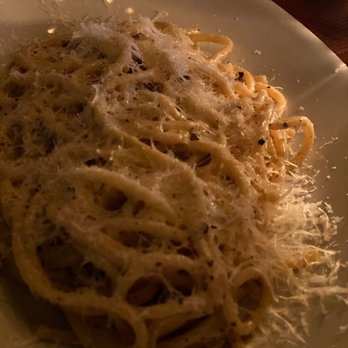 Pizza Carano - a plate of pasta with parmesan cheese - Pizza Near Me - Vancouver, British Columbia