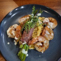 Grain & Grog American Tavern - Shrimp over risotto. Our thoughts: the shrimp needs a zip in flavor; and use bacon instead of prosciutto. Otherwise, perfect