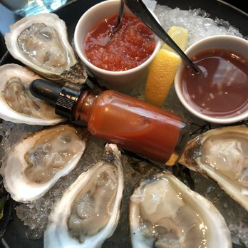 CUT - Chilled East Coast Oysters Citrus mignonette | cocktail sauce | espelette hot sauce. - Steakhouses Near Me - New York, New York CUT - Chilled East Coast Oysters Citrus mignonette | cocktail sauce | espelette hot sauce. - Steakhouses Near Me - New York, New York