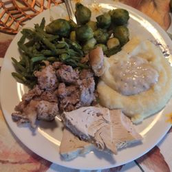 Il Ceppo - Green beans, turkey, apple sausage stuffing, mashed potatoes, and brussel sprouts.