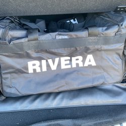 Flyers Unlimited - Duffle bag heated press lettering