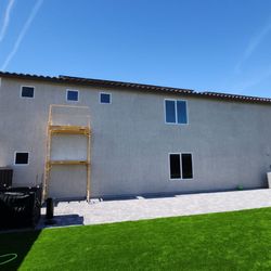 Performance Window Tinting - Downstairs with film upstairs without
