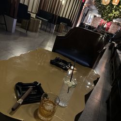 Trophy Bar Bourbon & Cigars - Underground cigar lounge....definitely gives that "speakeasy vibe"