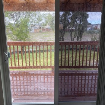 Wraps Tint - Privacy film being added to a balcony slide door - Home Window Tinting Near Me - Lemon Grove, California Wraps Tint - Privacy film being added to a balcony slide door - Home Window Tinting Near Me - Lemon Grove, California
