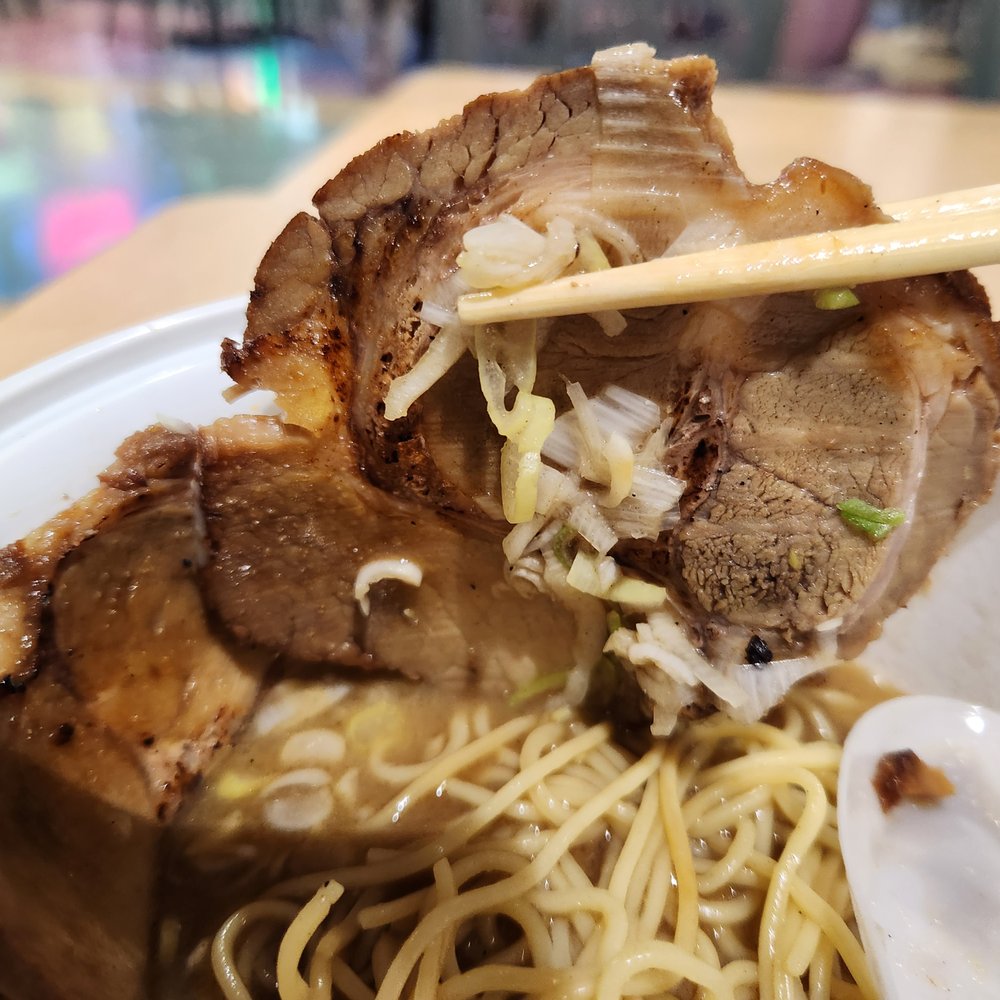 Torimaru Ramen - a bowl of ramen noodles with chopsticks - Ramen Near Me - Vancouver, British Columbia