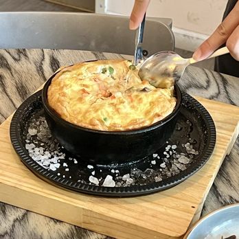Blue Peak Villa - Golden Egg In Cast Iron Pot - Chinese Near Me - New York, New York