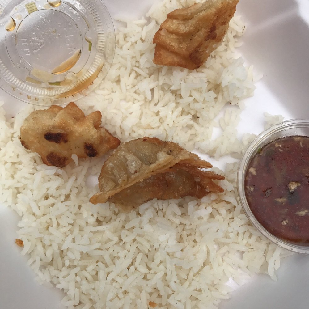 Jakarta Cafe - Grilled pork "dinner" pure grease on a bed of dry rice - Indonesian Near Me - Madison, Wisconsin Jakarta Cafe - Grilled pork "dinner" pure grease on a bed of dry rice - Indonesian Near Me - Madison, Wisconsin