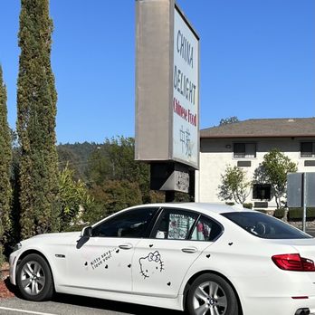 China Delight - The entrance to the parking lot & the Hello Kitty car you can see there often. - Chinese Near Me - Oakhurst, California