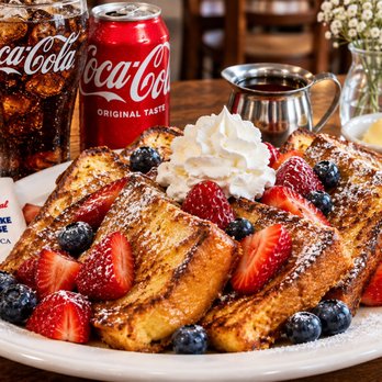 The Original Pancake House - Golden French toast topped with fresh strawberries, blueberries, powdered sugar, and whipped cream. A sweet and satisfying way to start your - Pancakes Near Me - Vista, California The Original Pancake House - Golden French toast topped with fresh strawberries, blueberries, powdered sugar, and whipped cream. A sweet and satisfying way to start your - Pancakes Near Me - Vista, California