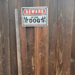 Affordable Arborist - Engravings in my fence boards (they did make this right, but odd this was the best choice to mark the fence)