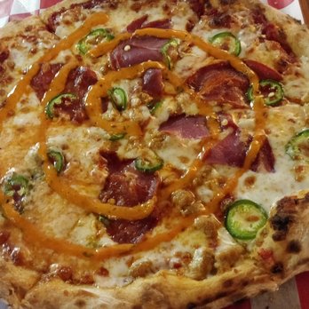 Flame and Pie - Mobile Pizzeria - Spicy sauce, sausage, chorizo, jalapenos, mozzarella. Nice kick! - Food Trucks Near Me Flame and Pie - Mobile Pizzeria - Spicy sauce, sausage, chorizo, jalapenos, mozzarella. Nice kick! - Food Trucks Near Me
