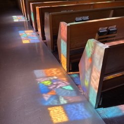 St Susanna's Rectory - Colors project on the floor from the stained glass windows.