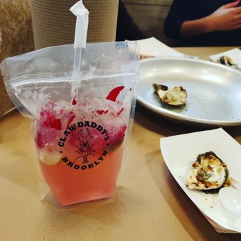Claw Daddy's - Adult Capri Sun (Rose and raspberry flavor) and grilled oysters - Cajun/Creole Near Me - Brooklyn, New York Claw Daddy's - Adult Capri Sun (Rose and raspberry flavor) and grilled oysters - Cajun/Creole Near Me - Brooklyn, New York