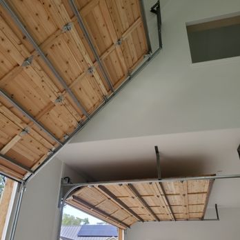 MOHD Service Solutions - Cedar door with roof pitch - Garage Door Services Near Me MOHD Service Solutions - Cedar door with roof pitch - Garage Door Services Near Me