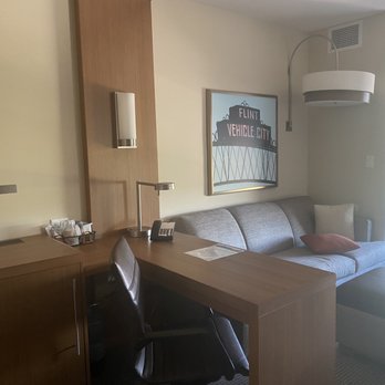 Hyatt Place Flint / Grand Blanc - Desk and sofa in room - Hotels Near Me - Flint, Michigan Hyatt Place Flint / Grand Blanc - Desk and sofa in room - Hotels Near Me - Flint, Michigan