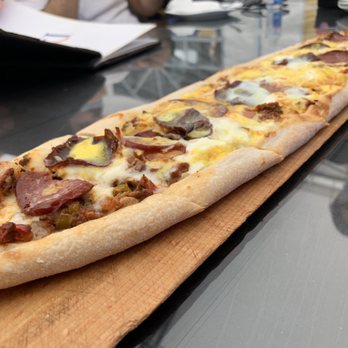 Tosun - Food- Mixed meat pide topped with two eggs - Turkish Near Me - Edgewater, New Jersey