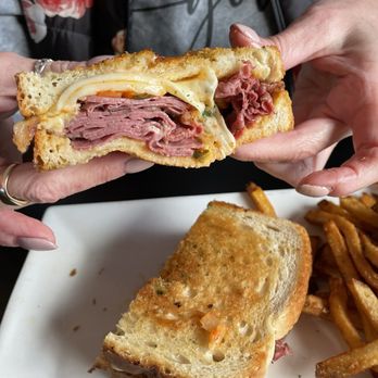 Finger Lakes Public House - Spicy kimchi pastrami Reuben with fries - Pubs Near Me - Canandaigua, New York Finger Lakes Public House - Spicy kimchi pastrami Reuben with fries - Pubs Near Me - Canandaigua, New York