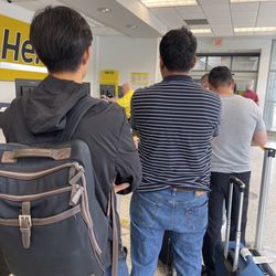 Hertz Rent A Car - Long line.