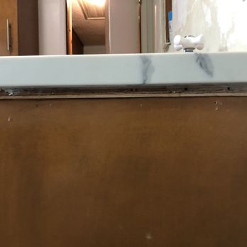 A&J CABINETS - Here is the second attempt at installing the granite in as you can see the plywood is exposed this plywood. - Cabinetry Near Me A&J CABINETS - Here is the second attempt at installing the granite in as you can see the plywood is exposed this plywood. - Cabinetry Near Me