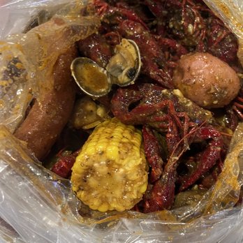 Raising Claw - the bucket: crawfish, clams, potatoes, corn, sausage - Seafood Near Me - Garden Grove, California Raising Claw - the bucket: crawfish, clams, potatoes, corn, sausage - Seafood Near Me - Garden Grove, California