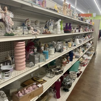 Goodwill Store - Shelves full of glassware and Knick knacks - Thrift Stores Near Me - Indianapolis, Indiana