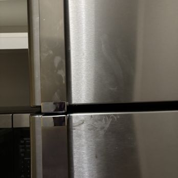 Mainstay Suites - Outside of refrigerator door and handles with visible brown sticky substance - Hotels Near Me - Carlisle, Pennsylvania Mainstay Suites - Outside of refrigerator door and handles with visible brown sticky substance - Hotels Near Me - Carlisle, Pennsylvania