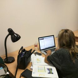 My Tutor - A student working by herself in an open work station