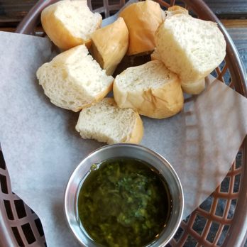 Bangers & Brews - Westside - Complimentary side of bread and chimichurri - German Near Me - Bend, Oregon Bangers & Brews - Westside - Complimentary side of bread and chimichurri - German Near Me - Bend, Oregon