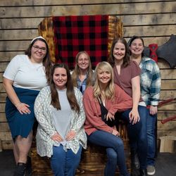 Dungeon Throwers - Group on the Dungeon Throne at Dungeon Throwers, Madison axe throwing fun for everyone.