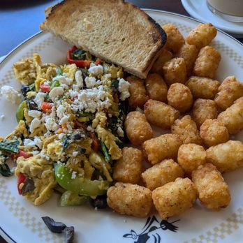 Caioti Pizza Cafe - Greek scramble with a side of tater tots and sourdough toast. - Pizza Near Me - Studio City, California